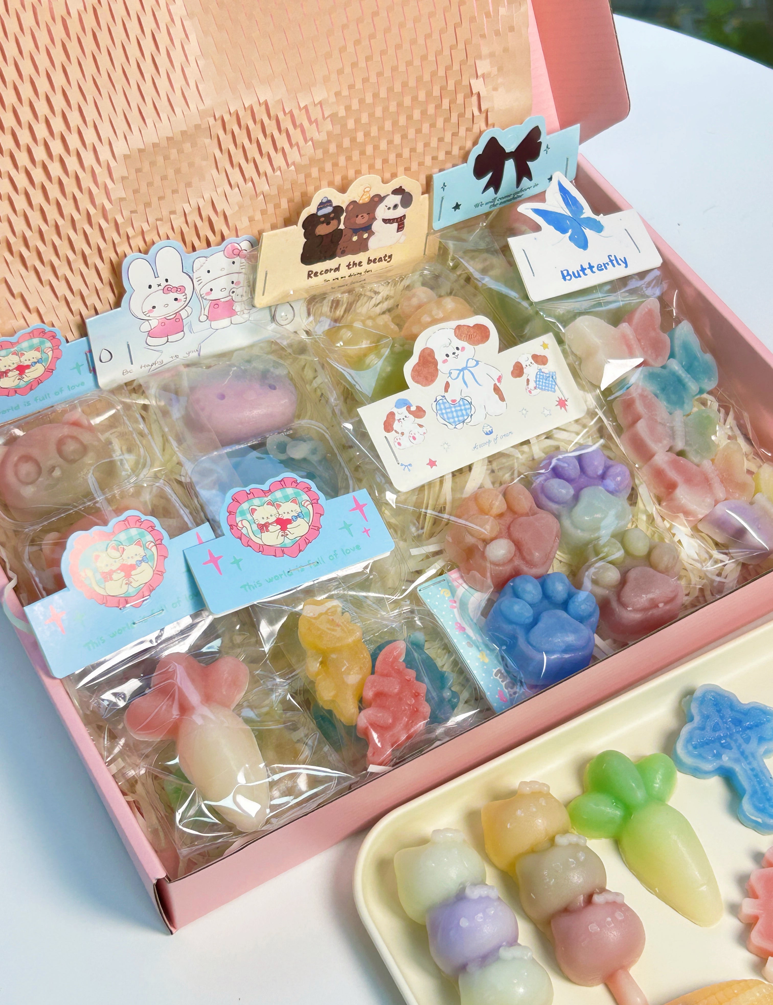 Oodles Candy Bulk Box filled with colorful handmade wax candy shapes individually wrapped