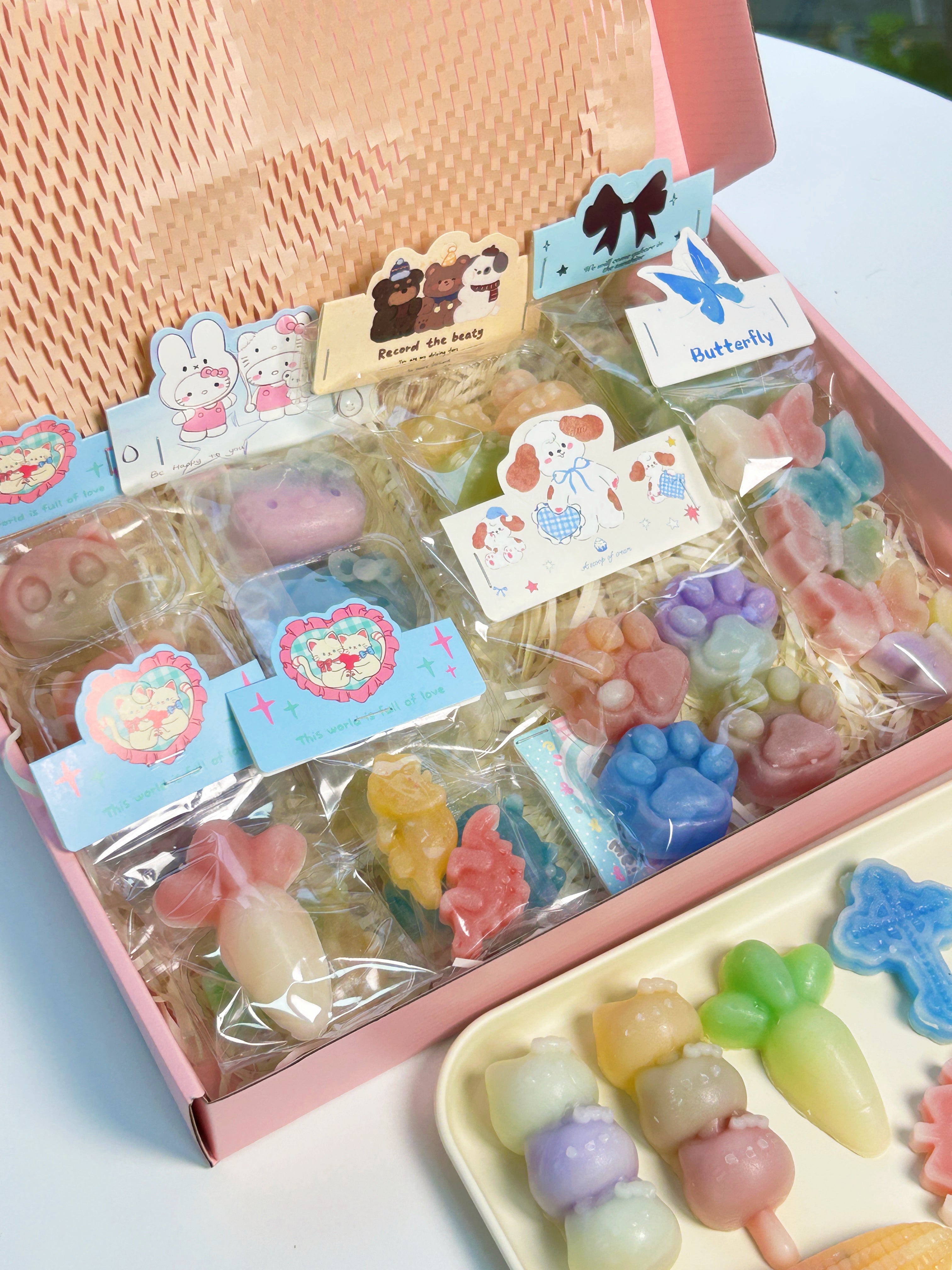 Oodles Candy Bulk Box filled with colorful handmade wax candy shapes individually wrapped